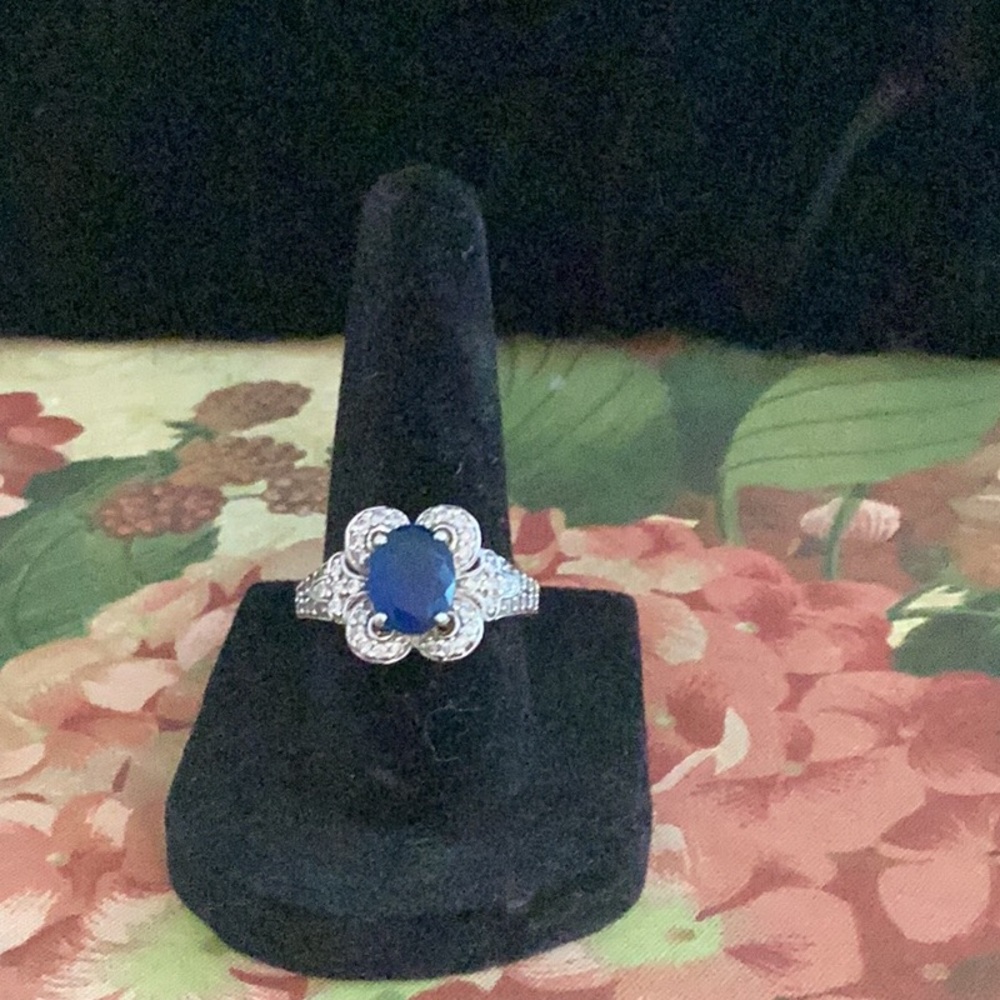 TECHNIBOND Wht. Gold Plated faux Blue Sapphire Ring with Clear Crystals